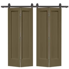 two brown doors with metal handles on each side