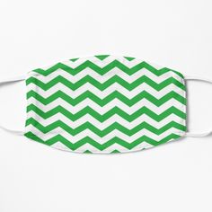 a green and white zigzag pattern face mask on a white background,