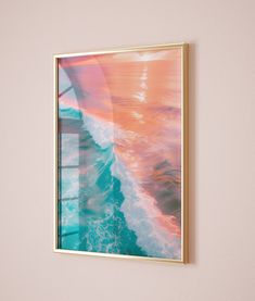 a painting hanging on the wall above a bed