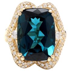 19.10 Carats Natural Impressive London Blue Topaz and Diamond 14K Yellow Gold Ring Total Natural London Blue Topaz Weight: Approx. 18.00 Carats London Blue Topaz Measures: Approx. 17 x 13mm Natural Round Diamonds Weight: Approx. 1.10 Carats (color G-H / Clarity SI1-SI2) Ring size: 7 (we offer free re-sizing upon request) Ring total weight: Approx. 13.5 grams Disclaimer: all weights, measurements and colors are approximate and may vary slightly from the listed dimensions or as seen in the image. Emerald Cut Aquamarine Ring, Topaz Yellow, Emerald Cut Rings, Etsy Gold Ring, Pretty Rings, Blue Zircon, Yellow Gold Ring, London Blue Topaz, London Blue