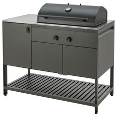 an outdoor grill with two doors and drawers