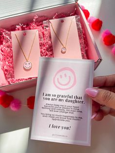 This set of necklaces makes for a perfect gift for your daughter- it's sure to bring a smile to your face and your daughter's too!. It includes two "Happy face" necklaces and comes with a lovely note, as shown in the picture. The necklaces are already packaged in a beautiful pink 5x7 inch box, ready to be gifted. At checkout, you can select the "this is a gift" option if you prefer not to display the invoice. PRODUCT DETAIL Necklace length: 15.5"with 16.5" and 17.5"Extender Gold dipped Hypoaller Inspirational Pink Jewelry For Gift, Inspirational Pink Jewelry For Gifts, Personalized Pink Jewelry For Mother's Day, Mother's Day Personalized Pink Jewelry Gift, Pink Inspirational Jewelry For Valentine's Day, Pink Jewelry For Mother's Day Personalized Gift, Pink Jewelry For Birthday Gift On Mother's Day, Pink Jewelry For Birthday And Mother's Day, Pink Hallmarked Necklaces As Gifts