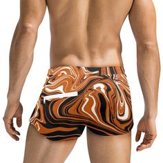 These team color inspired burnt orange shorts with a 2.5 inch inseam from BigTexFunkadelic are vibrant, lightweight and stretchy, making them perfect for your next summer event. They feature a drawstring waistband, inner lining (non-mesh), and a back zipper pocket. Can be utilized as unisex cover up/swimwear bottoms.• Made from 85% Polyester, 15% Spandex, smooth and lightly elastic.• Drawstring elastic waistband makes fit adjustable.• Printed using an advance heat sublimation technique, will not Brown Sports Shorts For Summer, Orange Short Swim Trunks With Built-in Shorts, Orange Swim Trunks With Built-in Shorts, Orange Swimwear With Built-in Shorts, Brown Summer Sports Bottoms, Orange Swimming Shorts With Built-in Liner, Casual Orange Swim Trunks Short Length, Orange Stretch Athletic Shorts For Summer, Casual Orange Swim Trunks