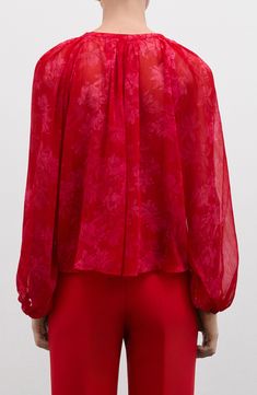 Delightful blooms brighten this charming semisheer top accented with fanciful frills. Ties at neck Long sleeves with elasticized cuffs 100% polyester Machine wash, line dry Imported Tie Neck Top, Tie Neck Tops, Red Fits, Printed Ties, Nordstrom Store, Tie Neck, No Frills, Neck Tie, Mango