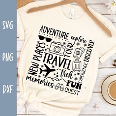 a t - shirt with the words adventure on it next to a cup of coffee