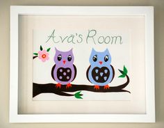 two owls sitting on a branch with the words ava's room