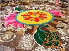 a decorated floor with flowers and peacocks on it