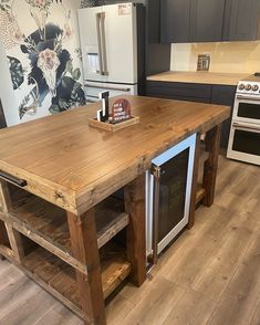 a kitchen island made out of wooden pallets