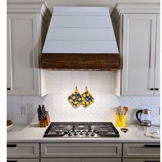 Custom Jon Archer Designs Shiplap Range Hood in a farmhouse-style kitchen above dropin cooktop Wooden Vent Hood, Pine Shiplap, Kitchen Hood Vent, Minwax Stain Colors, Shiplap Kitchen, Minwax Stain, Kitchen Prices, Barnwood Wall, Knotty Alder