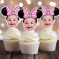 three cupcakes with minnie mouse heads on them