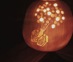 a carved pumpkin with some lights on it