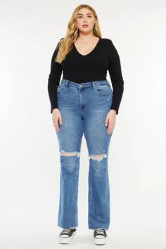 Sunflower High Rise Bootcut Jeans ( Plus Size) by Kancan | The Ultimate Denim Shop | Premium denim meets comfort | Designed in Los Angeles. Conquer the world with our Sunflower High Rise Bootcut Jeans. These bootcut jeans come in a charming medium wash style with minimal fading and whiskering. Sits above the waist and flares out with a frayed side slit hem. Shop now! plus size bootcut jeans, high rise bootcut jeans, plus size high rise jeans, sunflower bootcut jeans, plus size denim fashion Plus Size Bootcut Jeans, Bootcut Jeans Plus Size, Real Women Fashion, Jeans Outfit Fall, Fall Trends Outfits, Fall Attire, High Rise Bootcut Jeans, Conquer The World, Practice Outfits