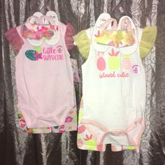 2 Sets Of 3 Pc. Outfits. Both Are Onesie, Shorts And Soft Bottom Sandals. First One Is White Onesie With Pineapples And Reads "Island Cutie" The Shorts And Sandals Have The Matching Pineapples On Them. The Second One Is A Pink Onesie With Hawaiian Flowers That Reads "Little Sunshine". The Shorts And Sandals Have The Matching Hawaiian Flowers. Both Sets Are Brand New With Tags Attached And Still On Hangers. **********Please Message Me For Additional Info Or Pics**********All Sales Are Final, No R Playful Stretchable Summer Sets, Playful Stretch Summer Sets, Fun Multicolor Sleeveless Sets, Fun Yellow Summer Sets, Fun Sleeveless Cotton Sets, Cute Yellow Sleeveless Sets, Stretch Playtime Sets For Summer, Stretch Sets For Summer Playtime, Fun Summer Playwear Sets