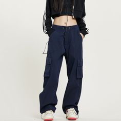 5ft 4''(166cm) tall, 95 lbs(43kg) weight and wearing a size S - Straight fit- Multi-pocket- Drape style- 2 colors Blue Cargo Pants With Pockets For Outdoor Activities, Blue Cargo Pants With Pockets For Outdoor, Sporty Full-length Parachute Pants With Hip Pockets, Sporty Wide Leg Cargo Jeans With Pockets, Casual Blue Pants With Functional Pockets, Functional Full-length Bottoms With Cargo Pockets, Sporty Full-length Bottoms With Multiple Pockets, Full Length Cargo Jeans For Outdoor, Sporty Straight Cargo Pants With Pockets