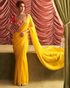 Shop this Usha Sari Set by Seema Thukral at KYNAH. Enhance your traditional attire with our usha sari set. The set features a beautifully embellished choli and a delicately designed organza sari with a matching petticoat. Elevate your style with our elegant and intricate design, perfect for any occasion. Yellow Saree For Haldi, Yellow Organza Saree, Outfits Moodboard, Yellow Sari, Organza Sari, Lehenga Design, Bridal Lehenga Designs, Yellow Saree