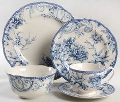 a blue and white china dinner set