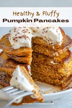 a stack of pumpkin pancakes with frosting on top and the words, healthy & fluffy pumpkin pancakes