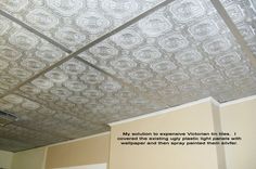 the ceiling in an office building is covered with tin foil and has a quote written on it