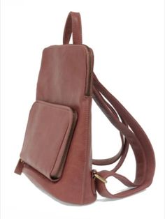 A rose-colored backpack with a front pocket and adjustable straps, made from smooth material. Mini Backpack, Daily Look, Statement Pieces, Fashion Forward, Raspberry, Bag Lady, Backpacks