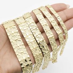 Here's a meaningful gift for Nugget Bracelet collectors. From our Bracelet collection, this 10K Yellow Gold Nugget Textured Rectangle Edge Link Bracelet features Shiny & Diamond Cut finish. Product Details: Metal: Real 10K Gold 5.5mm - 11.81 grams (1.47 g/in) 8.0mm - 16.36 grams (2.04 g/in) 9.0mm - 17.25 grams (2.15 g/in) 11mm - 17.80 grams (2.22 g/in) 13.5mm - 25.47 grams (3.18 g/in) 16mm - 30.73 grams (3.84 g/in) Length: All weight are written in 8" version. The weight will change depending on Hidden Lock, Nugget Bracelet, Gold Nugget, Dope Jewelry, Fine Jewelry Bracelets, Gold Plated Bracelets, Bracelet Collection, Mens Jewelry Bracelet, Jewelry Business