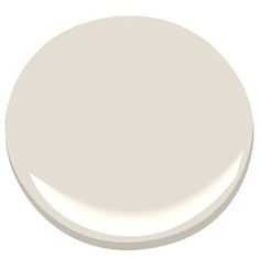 a white paint color with an oval shape on the top and bottom, it is light gray