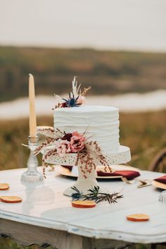 a white cake sitting on top of a table