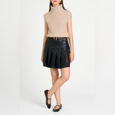 Side Zip Closure Fully Lined Pocket On Each Hip Stitched Pleating Detail Belt Not Included Faux Leather Pleated Skirt, Capsule Wardrobe Essentials, Leather Pleated Skirt, Faux Leather Skirt, Ribbed Sweater, Raw Edge, Cap Sleeve, Turtleneck Sweater, Capsule Wardrobe