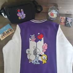 Varsity style, fleece jacket. Embroided with BT21 Characters on back. Your bias Tiny Tan, and BTS logo on front. Winter Cotton Varsity Jacket With Embroidered Patch, Winter Cotton Outerwear With Custom Embroidery, Casual Purple Varsity Jacket For Winter, Casual Purple Long Sleeve Varsity Jacket, Bt21 Characters, Bts Clothes, Army Shoes, Army Accessories, Bts Bg