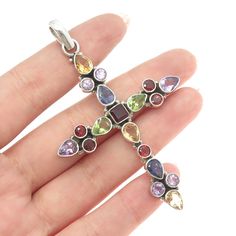 Great vintage condition.  925 Sterling Silver Vintage Amethyst Garnet Citrine Peridot Iolite Cross Pendant  Weight: 13.0g   WELCOME TO PAWN SHOP We are an actual pawn shop and have been in business for over 25 years. Since 1990, our establishment has been serving a variety of clients by providing them with short term cash solutions and options of liquidity regarding their treasured heirlooms. Acknowledging that today′s customers are very sophisticated and are looking for a variety of investments Multicolor Multi-stone Sterling Silver Gemstones, Multicolor Multi-stone Gemstones In Sterling Silver, Spiritual Silver Multi-stone Gemstones, Multicolor Multi-stone Amethyst Jewelry, Pawn Shop, 25 Years, Cross Pendant, Citrine, Garnet