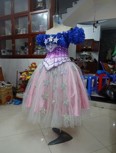 a dress made out of tulle with stars on it