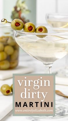 a martini glass with olives in it and the words virgin dirty martini on top