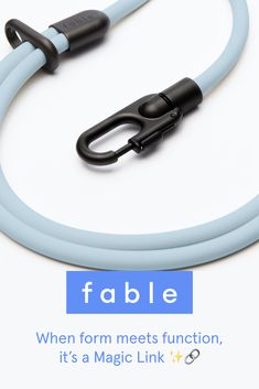 a blue cable connected to a black and white cord with the words fable on it