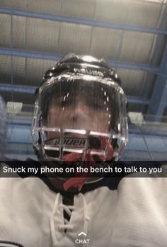 a man wearing a hockey helmet and holding his hands behind his head with the words snack my phone on the bench to talk to you