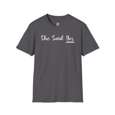 She Said Yes Groom Shirt, Groom Shirt, Engagement Gift For Bride, Engagement shirt, engagement gift, Engagement Party Shirt, Groom shirt Introducing our "She Said Yes" T-shirt - a heartfelt and celebratory expression of love and commitment. Crafted from soft, high-quality fabric, this shirt seamlessly blends comfort with the joyous announcement, making it an essential addition to your engagement celebration. The bold and joyful statement, "She Said Yes," proudly communicates the happiness and excitement of this special moment. Whether you're the thrilled proposer or sharing in the joy as a supportive friend or family member, this T-shirt is a delightful way to share the news in style. The design is tastefully bold, allowing the celebratory message to take center stage. Wear it with jeans f Engagement Shirt, Engagement Gifts For Bride, Groom Shirts, Engaged Shirts, She Said Yes, Supportive Friends, Engagement Celebration, Gift For Bride, Engagement Style