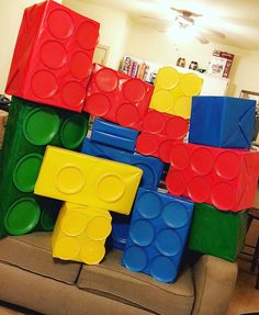 there are many lego blocks stacked on top of each other in this living room area