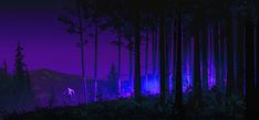 a man standing in the middle of a forest at night with purple light on his face