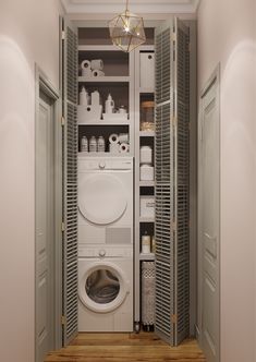 a washer and dryer sitting inside of a closet