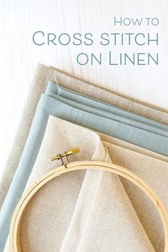 a cross stitch on linen with the title how to cross stitch on linen