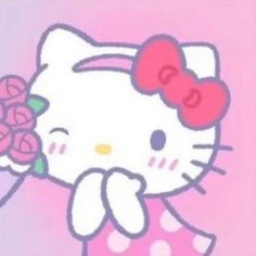 an image of hello kitty with roses in her hair