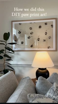 a lamp sitting on top of a table next to a couch