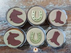 six cupcakes decorated with different designs on top of each other in tins