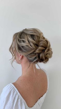 Low Messy Bun Wedding Hair Loose Curls, Debs Hair Updo, Low Messy Bun Prom Hair, Deb Hairstyles Bun, Wedding Updos For Medium Hair Front View, Low Messy Wedding Bun, Low Updo Prom Hair, Prom Updos Bun, Prom Hair Bun Low