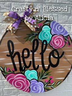 a wooden sign with flowers painted on it that says, crafty in blessing by alice