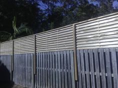 a wooden fence with slats on it