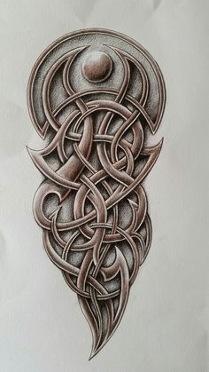 a drawing of an intricate design on paper