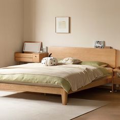 a bed room with a neatly made bed and two night stands on the side tables