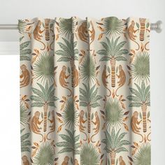 a curtain with monkeys and palm trees on it