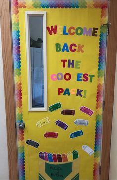 a door decorated with the words welcome back to the coolest pack