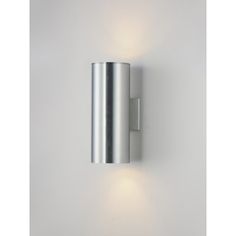 a wall mounted light on the side of a white wall with two lights attached to it