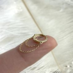 Our bestselling, statement chain hoop earrings are handcrafted in 9K solid gold. Let them add (more than some) twist to your daily style. Ships within 3 business days. - Earring size: 19mm - Inner diameter: 6.5mm - Sold as Single or A Pair. - Made in 9 karat gold. - Stamp with 9K. Gold Sterling Silver Chain Ring, Sterling Silver Chain Ring In Gold Color, 14k Gold Hoop Jewelry With Adjustable Chain, Tarnish Resistant Link Hoop Earrings As Gift, Dainty Yellow Gold Hoop Earrings With Adjustable Chain, Tarnish-resistant Link Hoop Earrings As Gift, Gold Dangle Hoop Earrings With Chain Detail, Gold Dangle Hoop Earrings With Chain, Dainty Gold-plated Hoop Earrings With Adjustable Chain